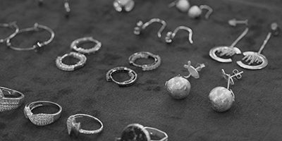 Semi-finished 925 sterling silver rings and pendants before polishing