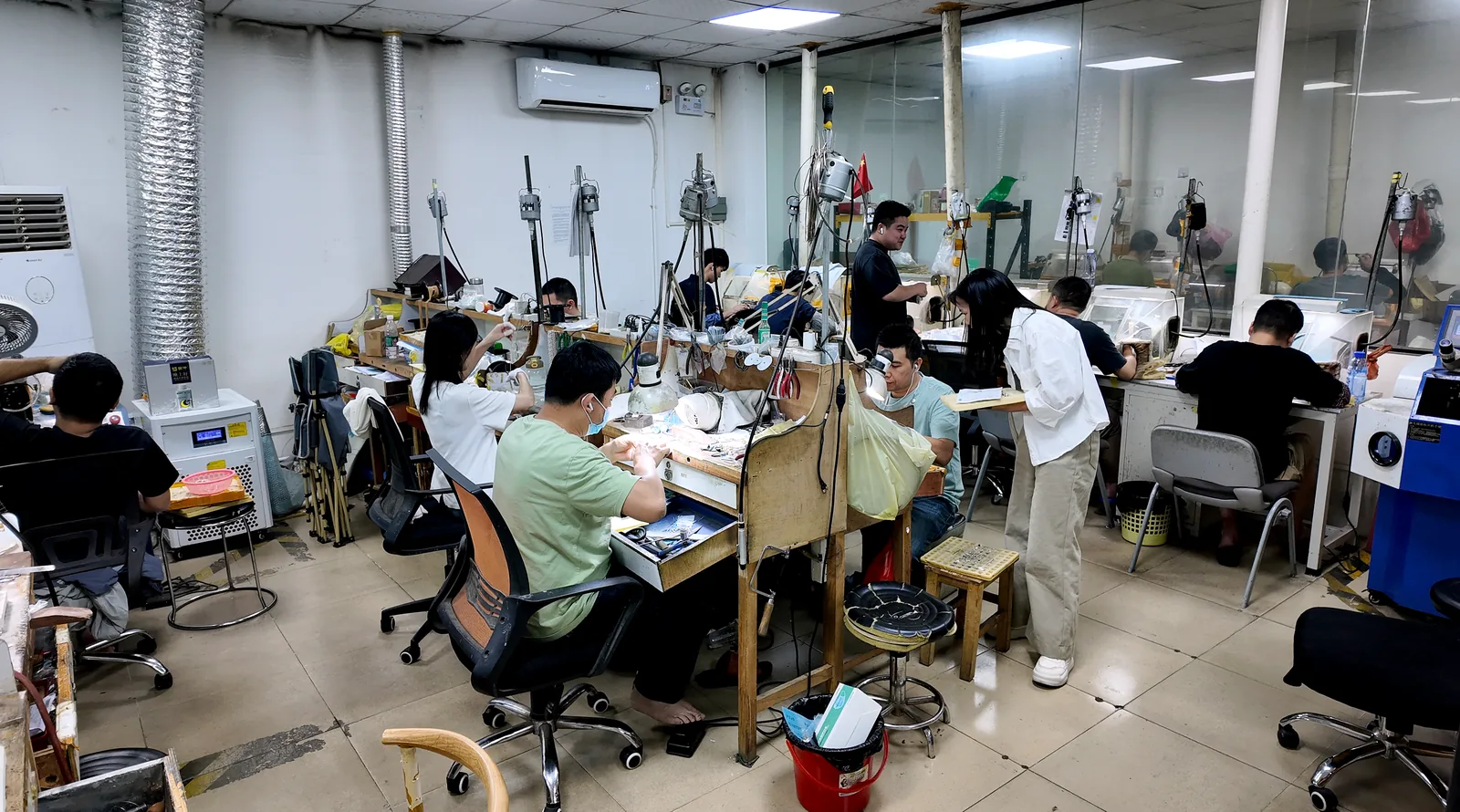 Finishing and polishing stations on the jewelry workshop floor