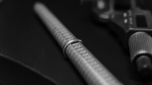 Ring sizer stick and digital caliper used to check 925 sterling silver ring sizes